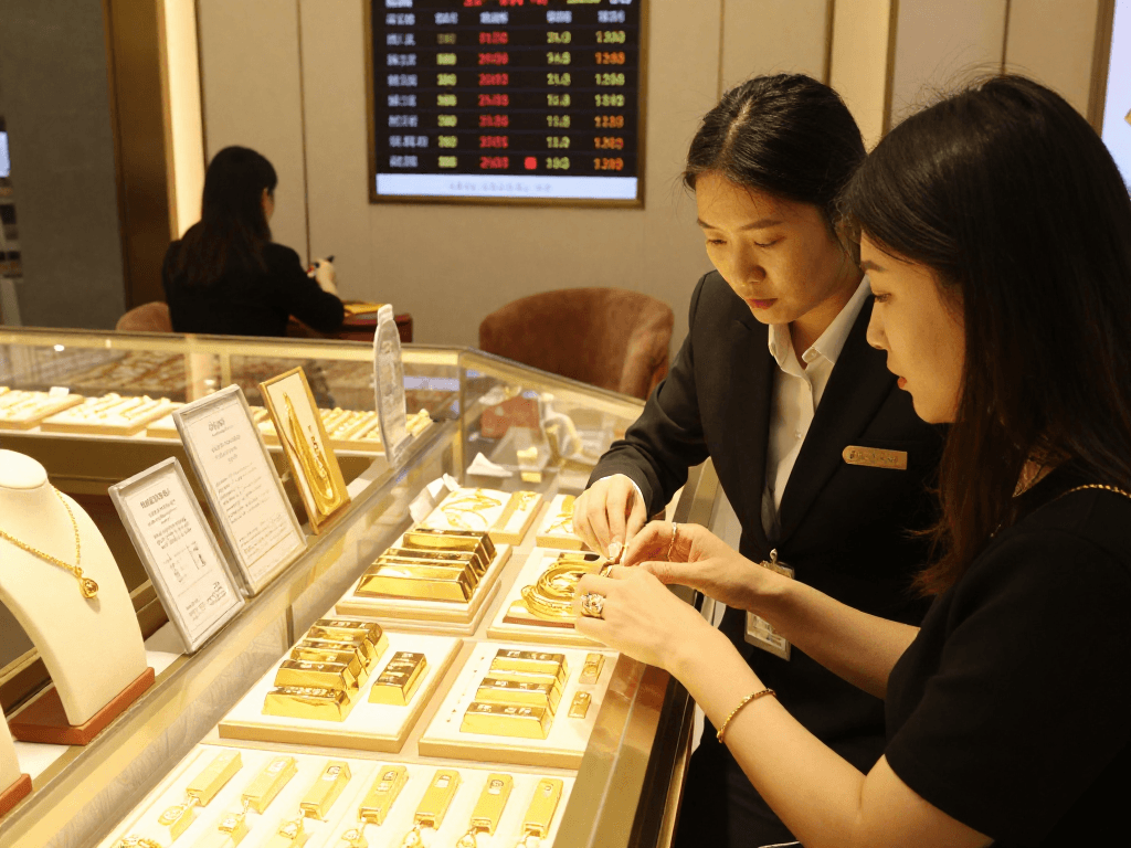 mantra 88 jewelry showcase in luxurious gold market with current prices displayed